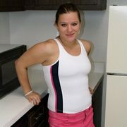 Ponytailed voluptuous teen babe Christy showing her huge tits in the kitchen